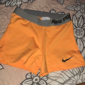 Orange Nike pro spandex